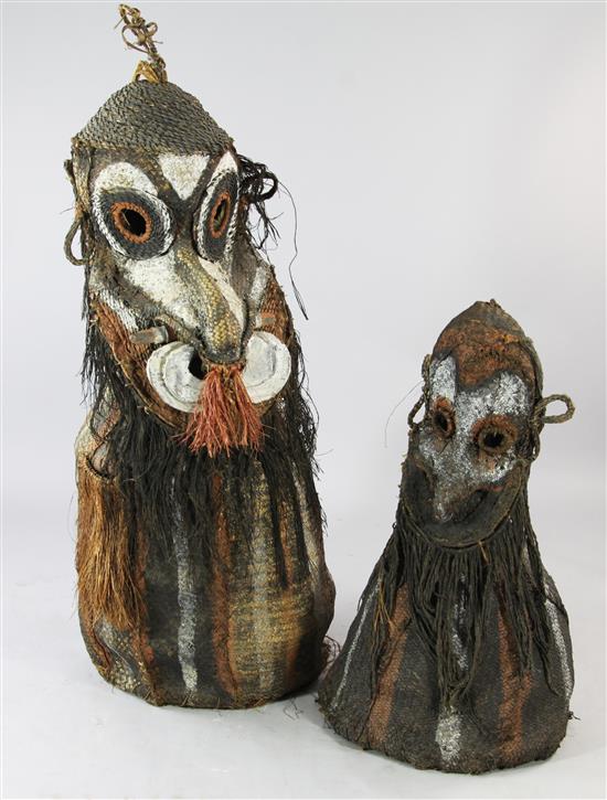 Two Sepik River woven tumbuan masks